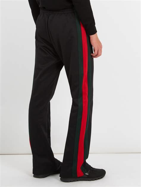 gucci track pants black|Gucci side stripe track pants.